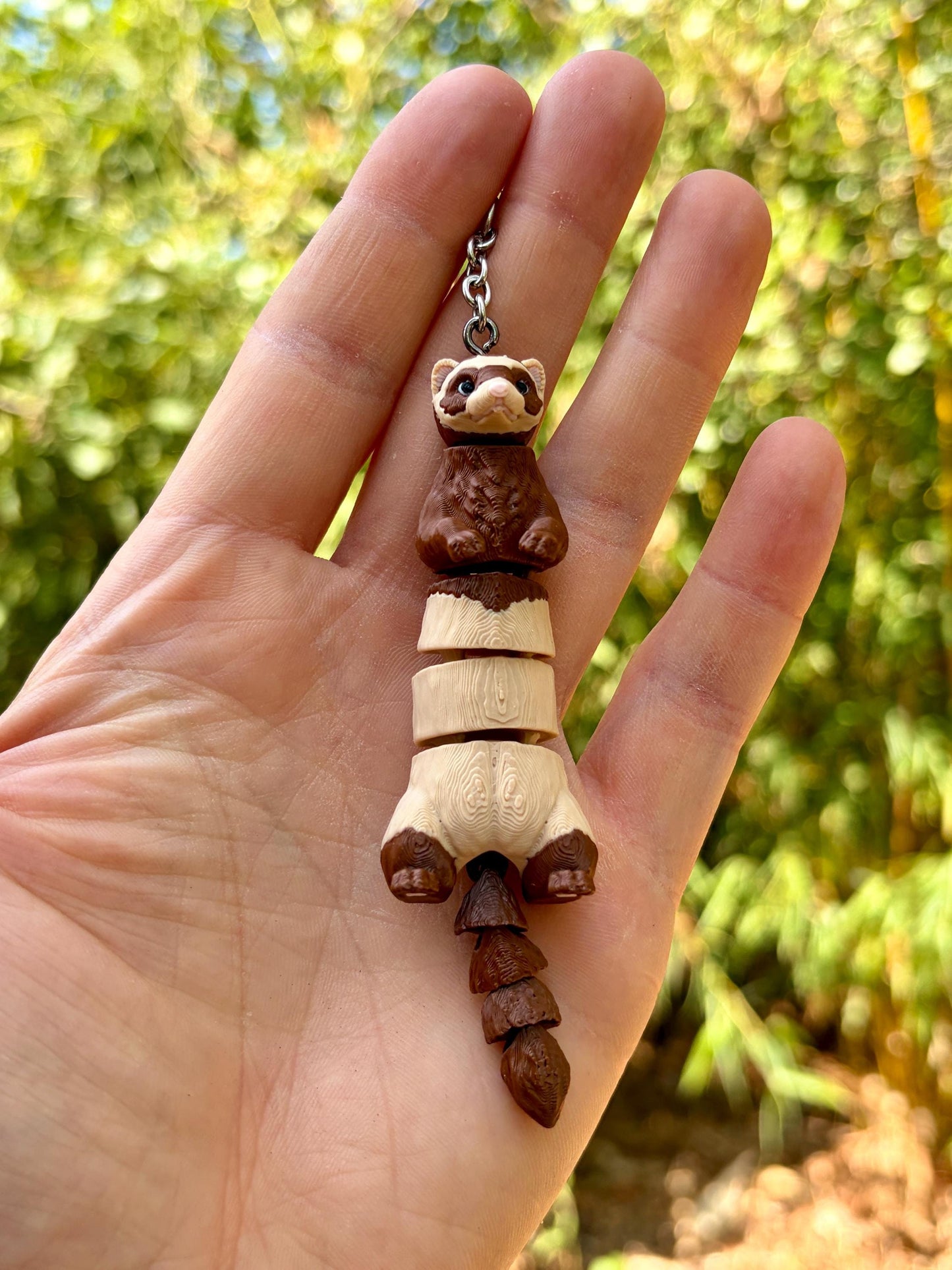 Articulated ferret keychains