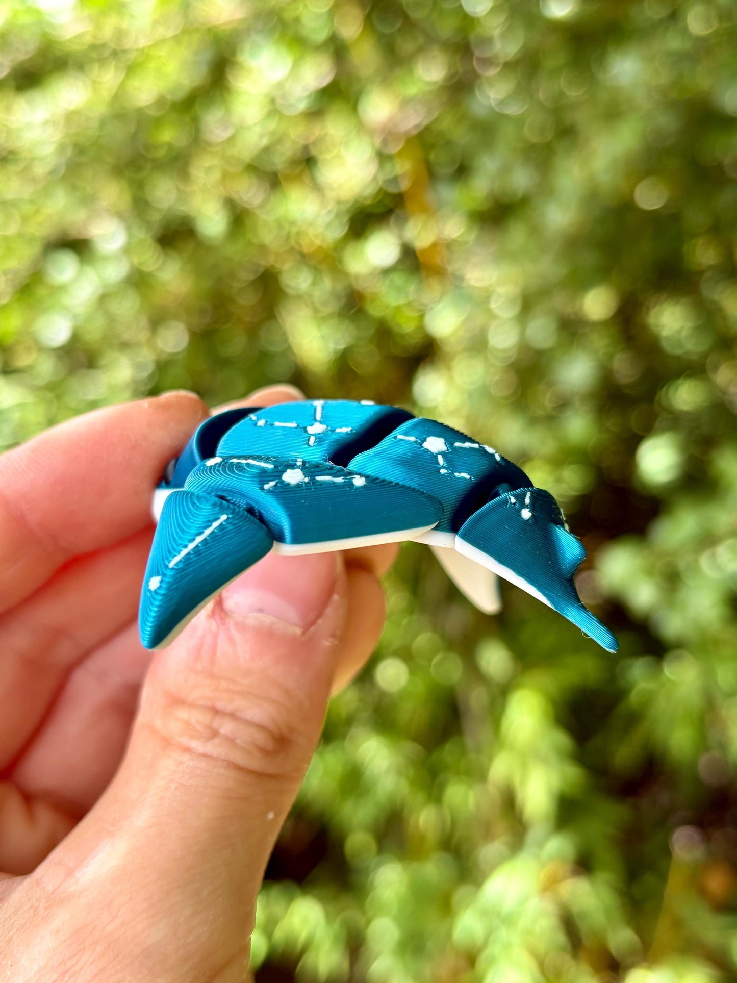 Articulated manta ray keychains