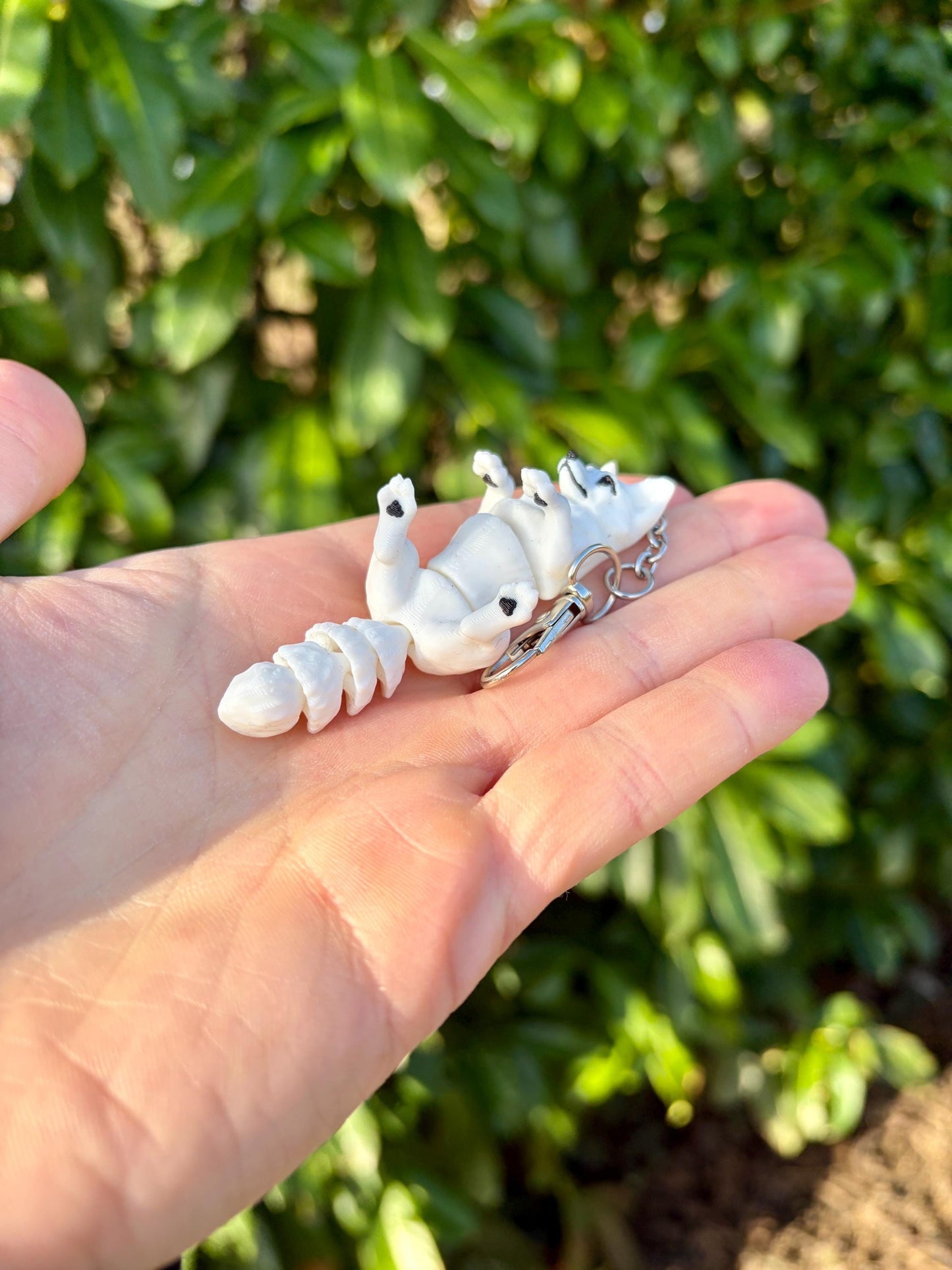 Articulated arctic fox keychain