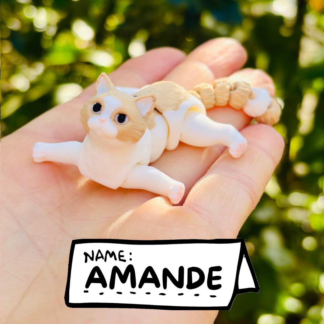 Articulated beige cat keychains