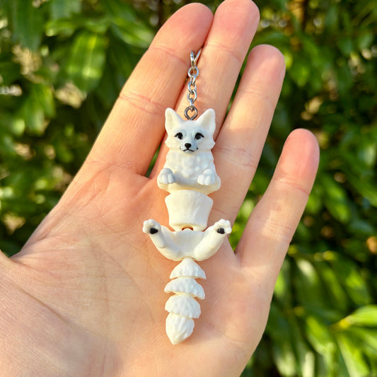 Articulated arctic fox keychain