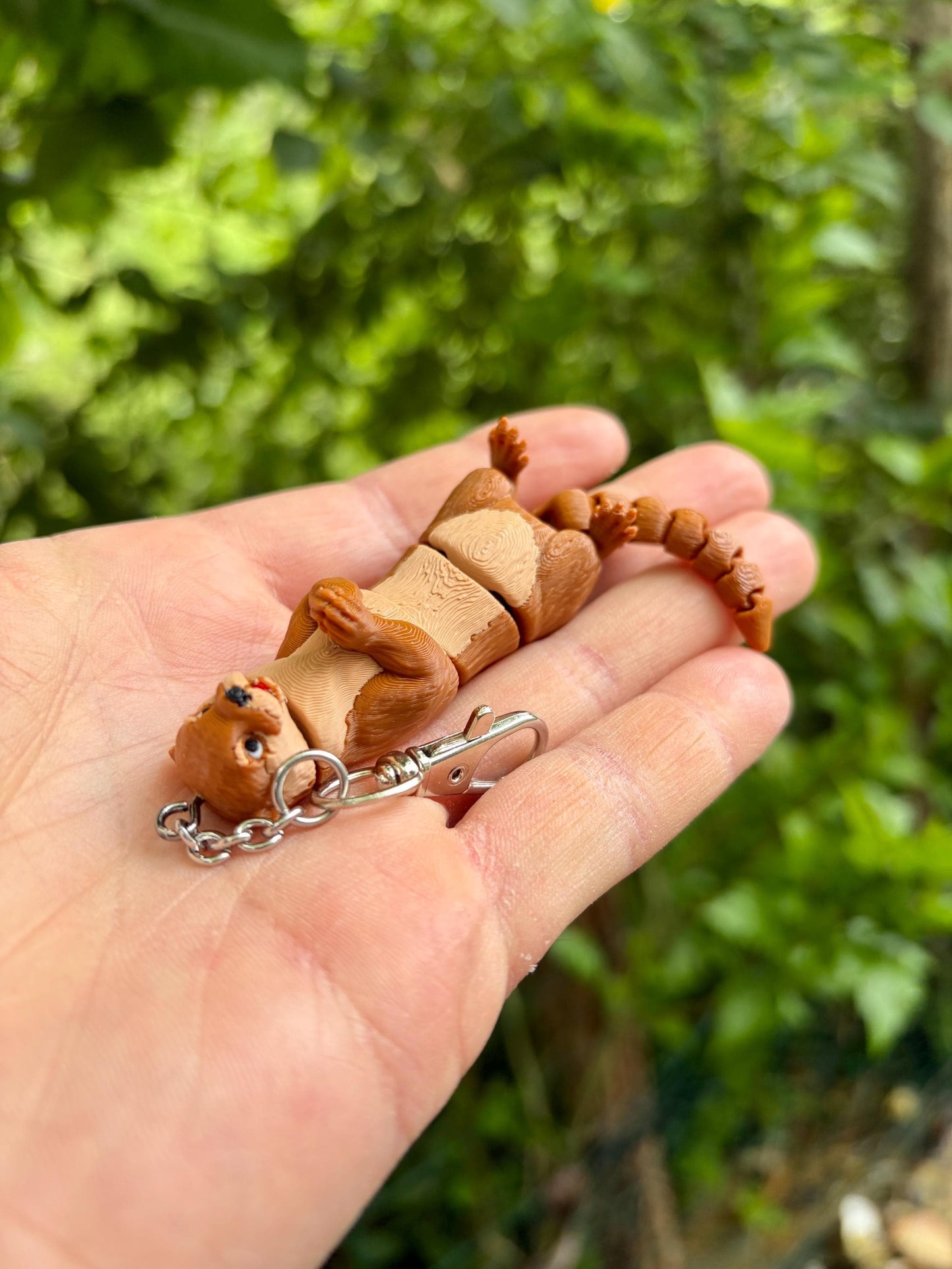 Articulated otter keychain