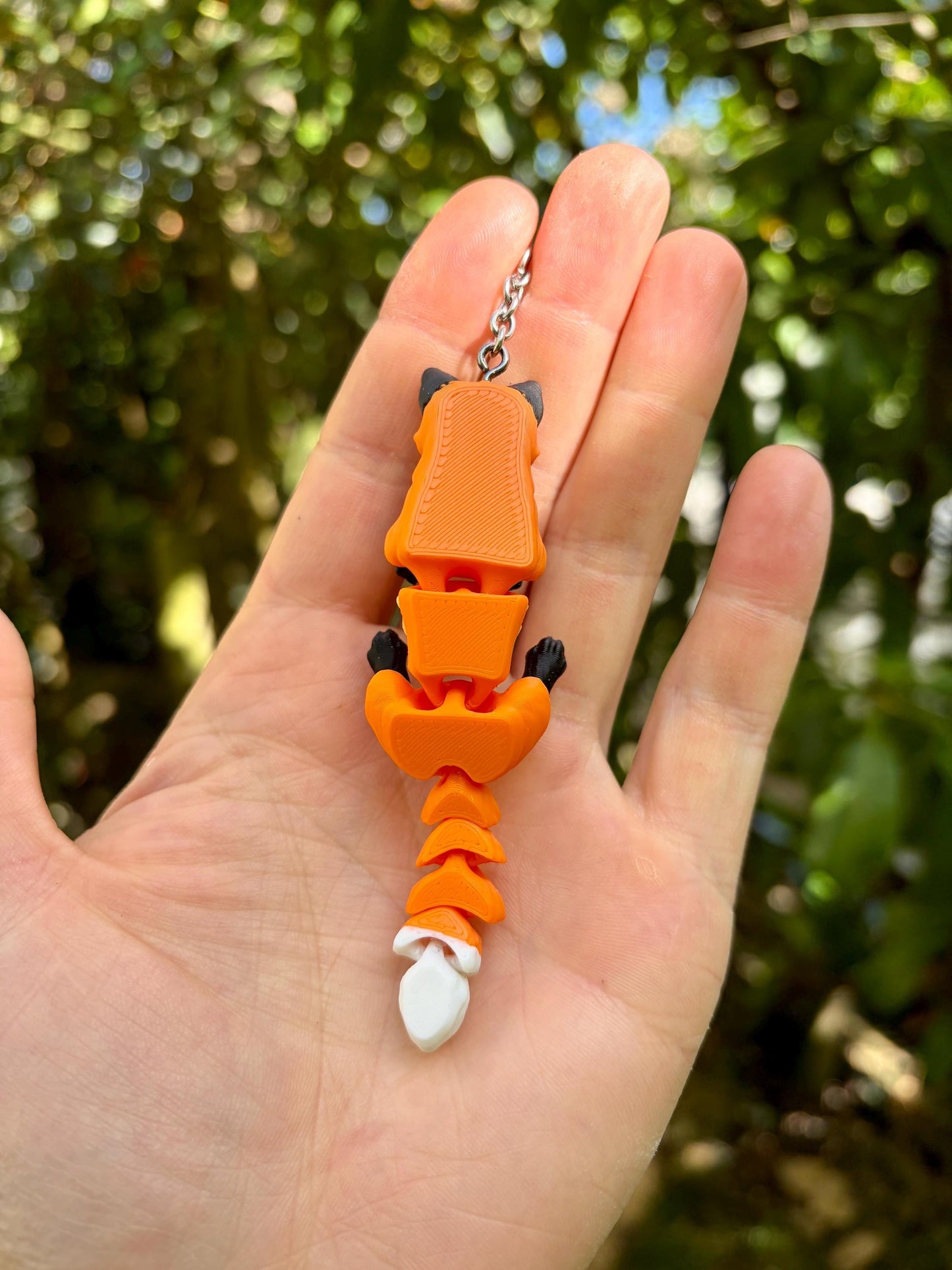 Articulated glow-in-the-dark skeleton fox keychain