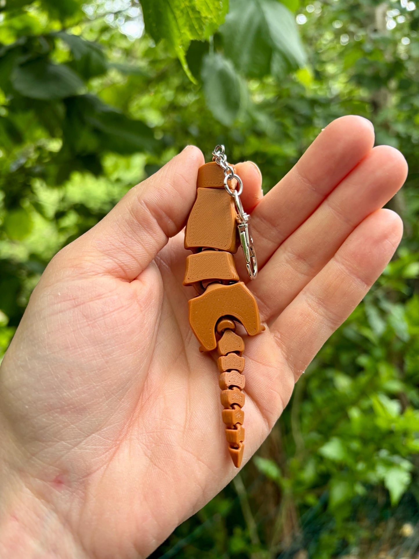 Articulated otter keychain