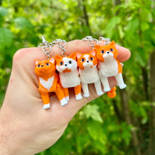 Jointed ginger cat keychains