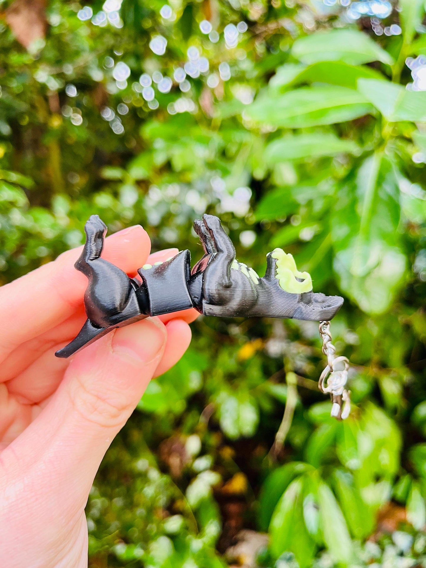 Glow-in-the-dark articulated skeleton dog keychain