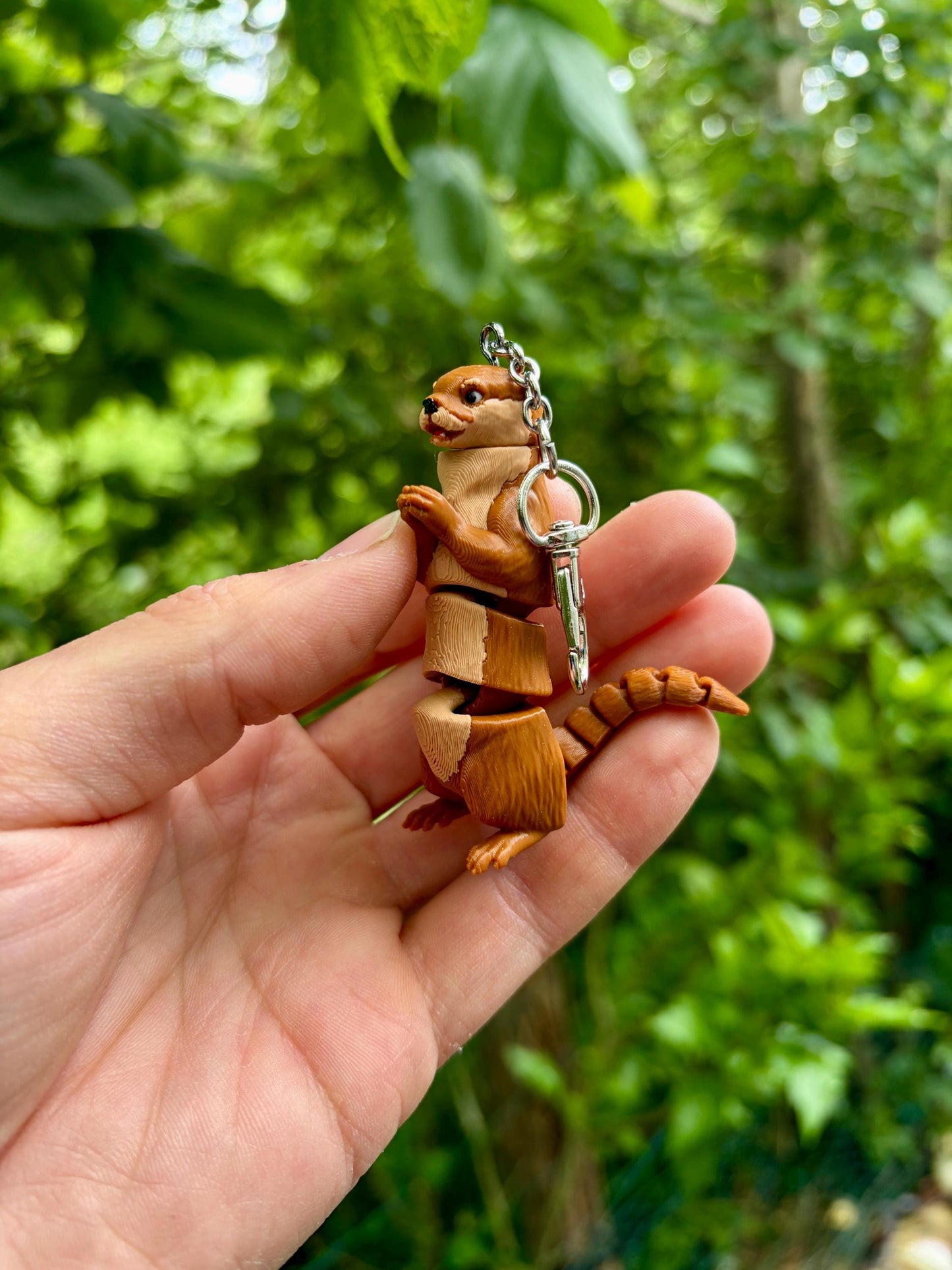 Articulated otter keychain