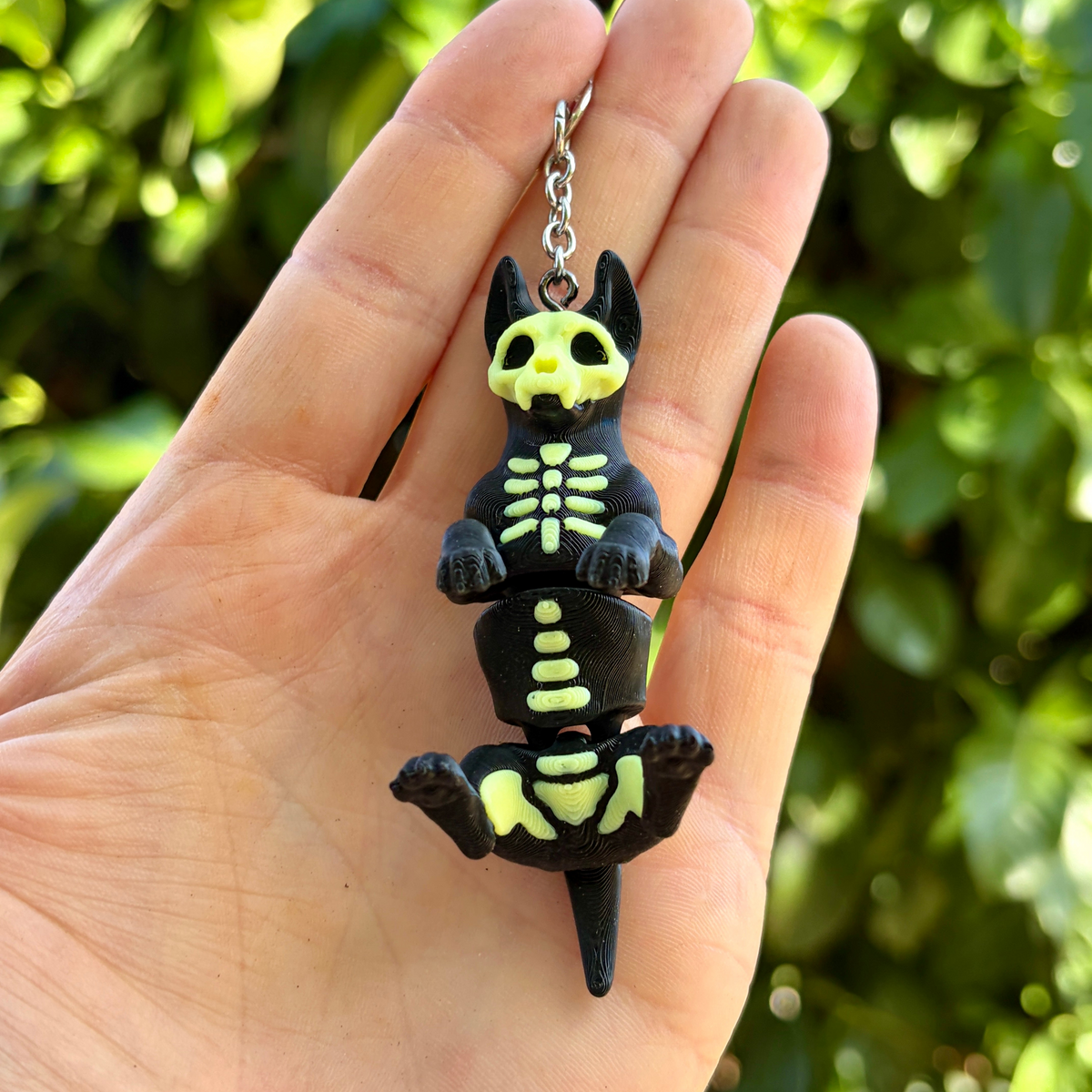 Leuchtender Glieder-Skeletthund-Schlüsselanhänger