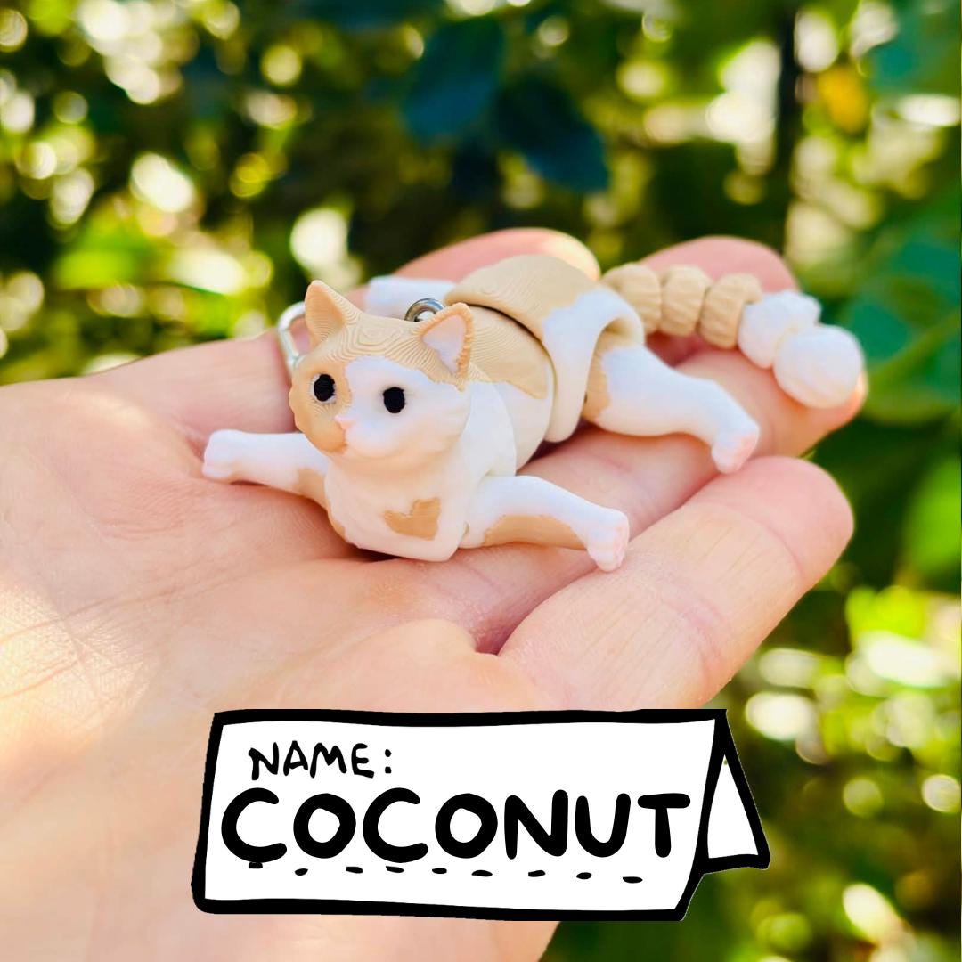 Articulated beige cat keychains