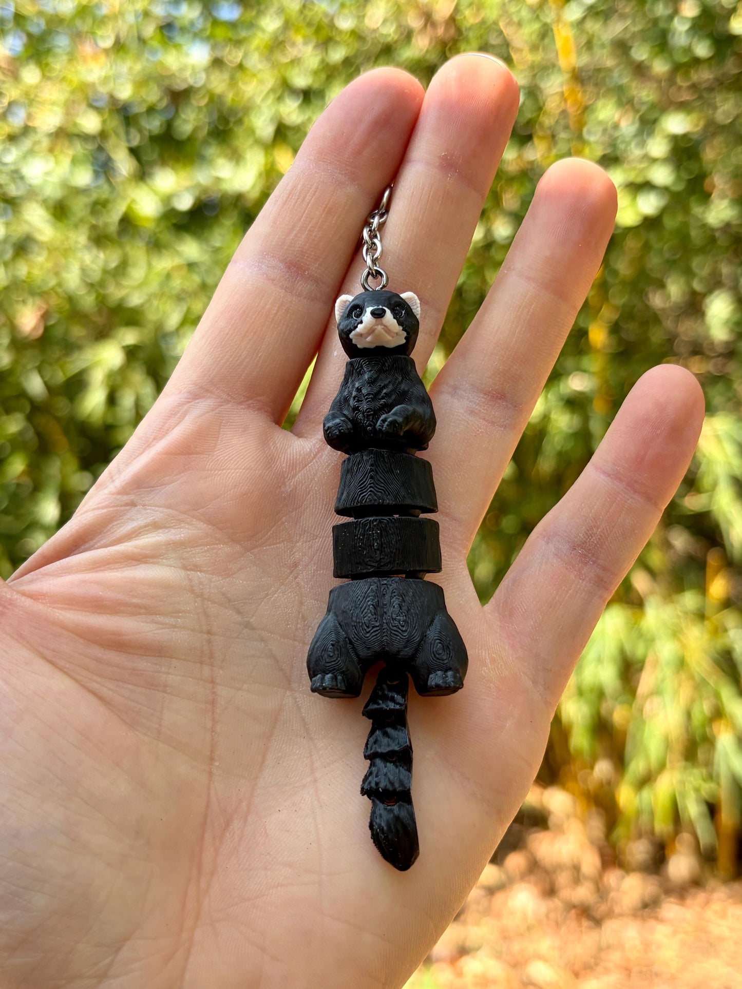 Articulated ferret keychains