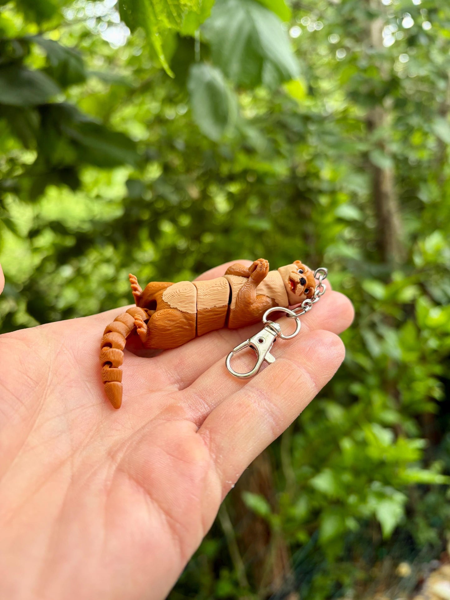 Articulated otter keychain