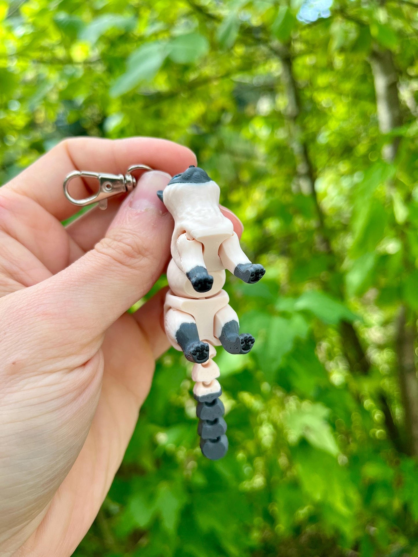 Articulated grey Siamese cat keychain