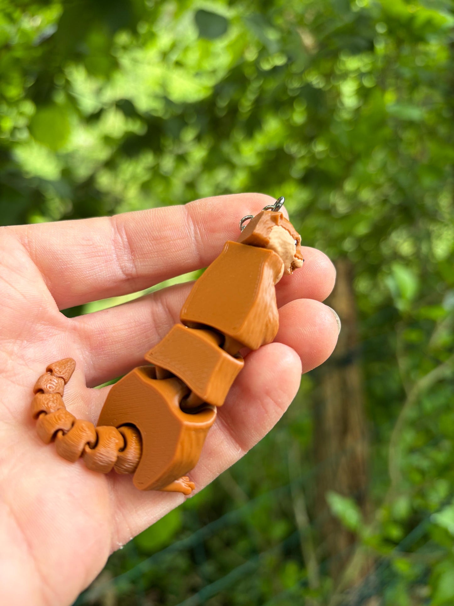 Articulated otter keychain