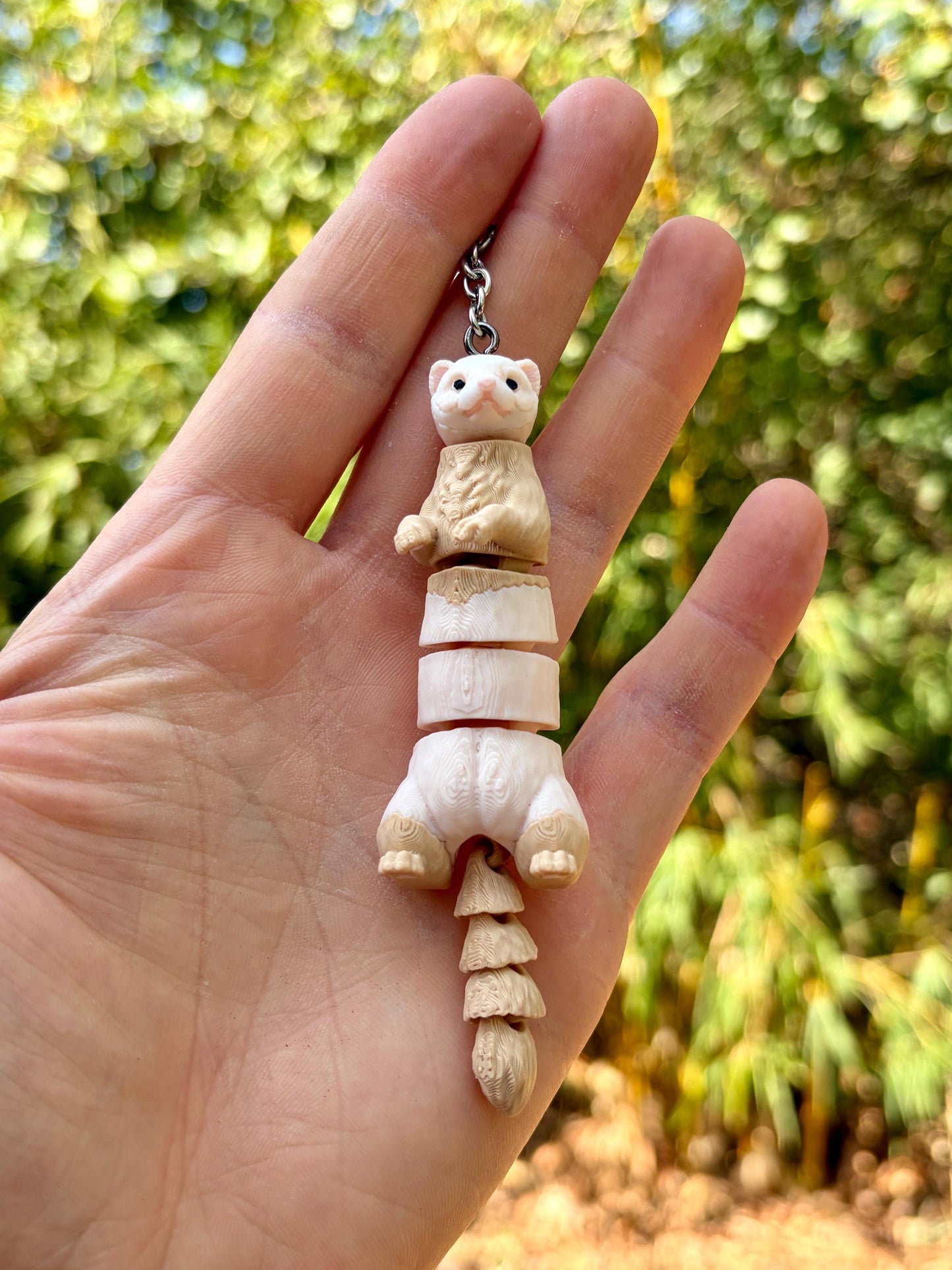 Articulated ferret keychains