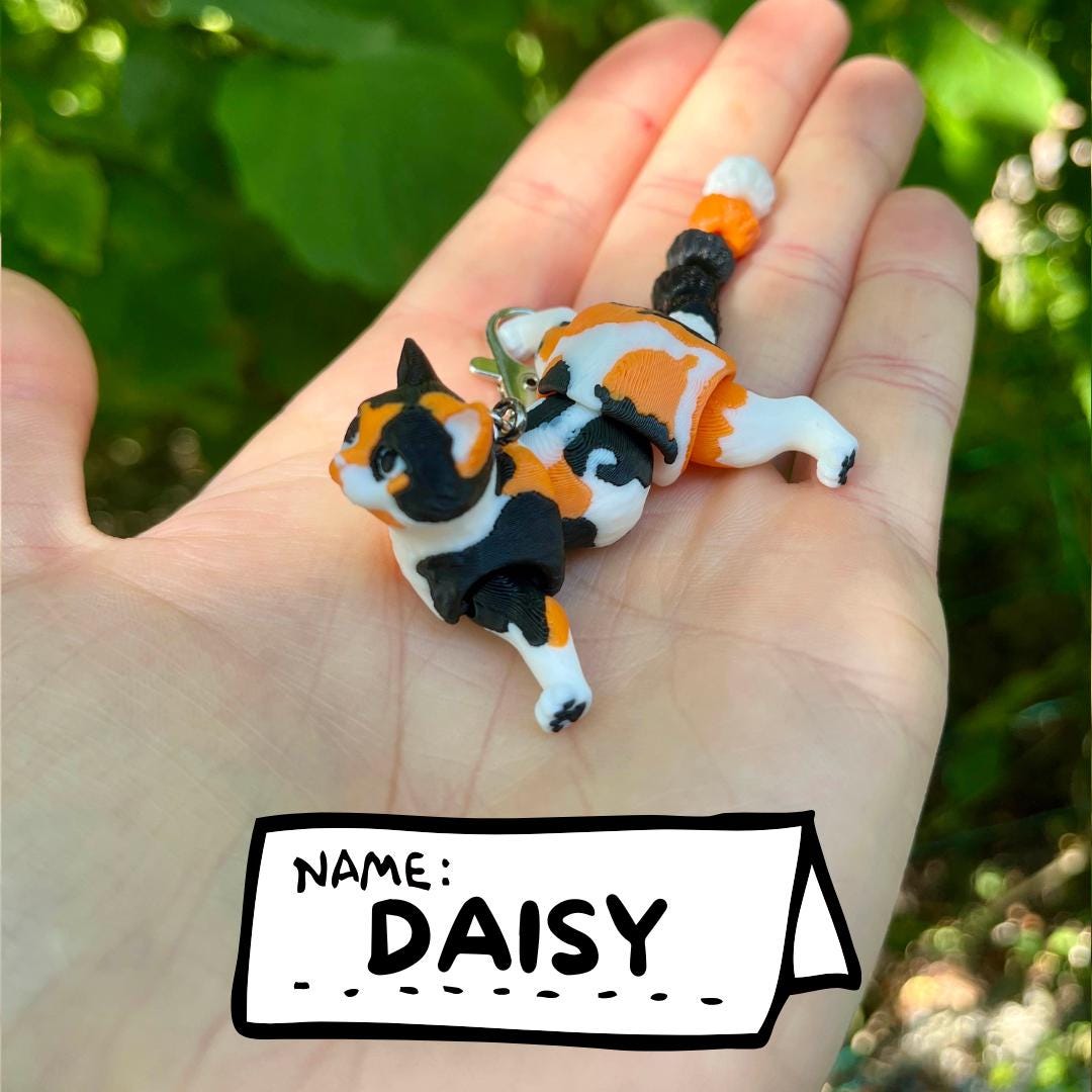 Articulated calico cats keychains