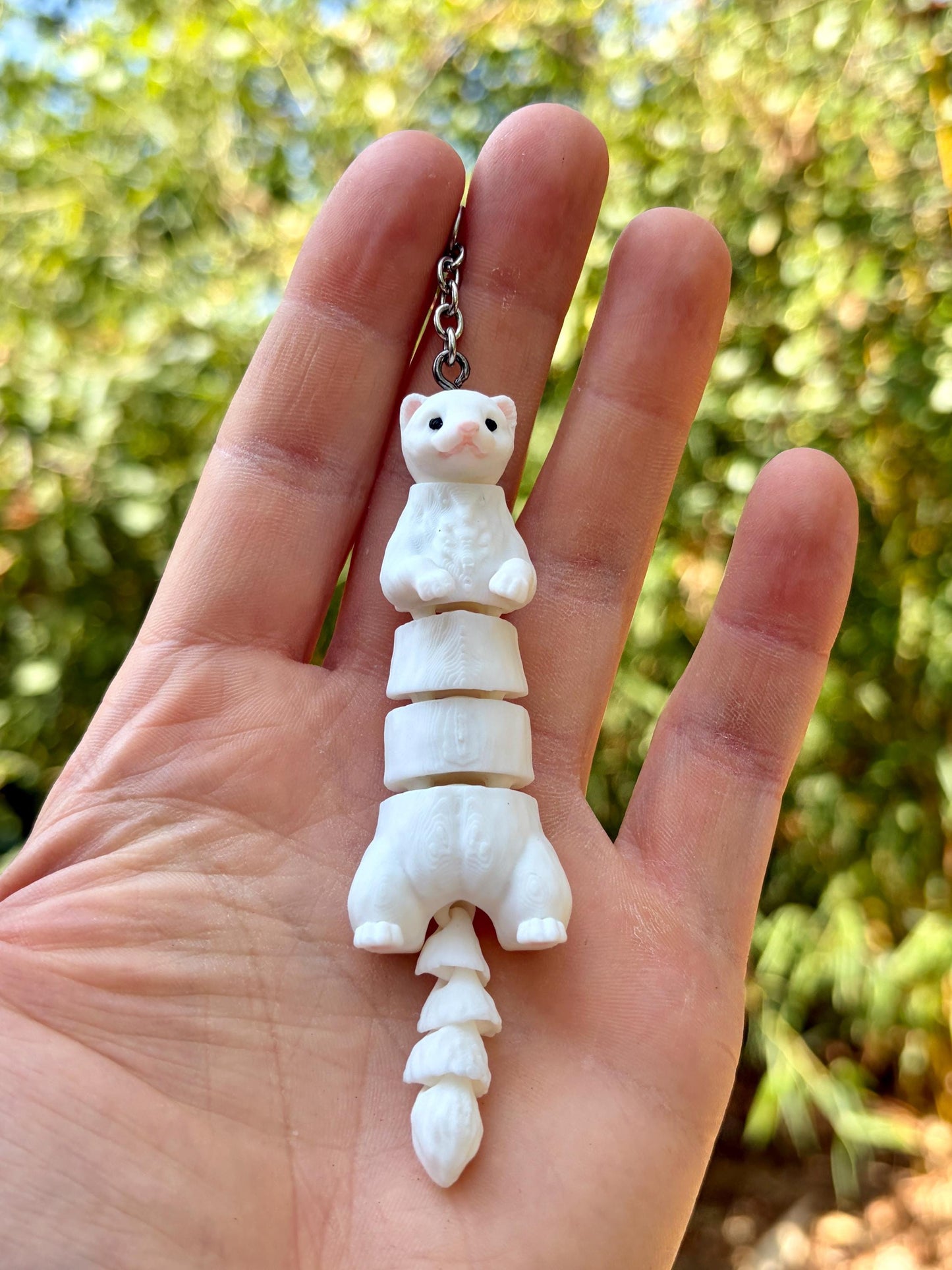 Articulated ferret keychains