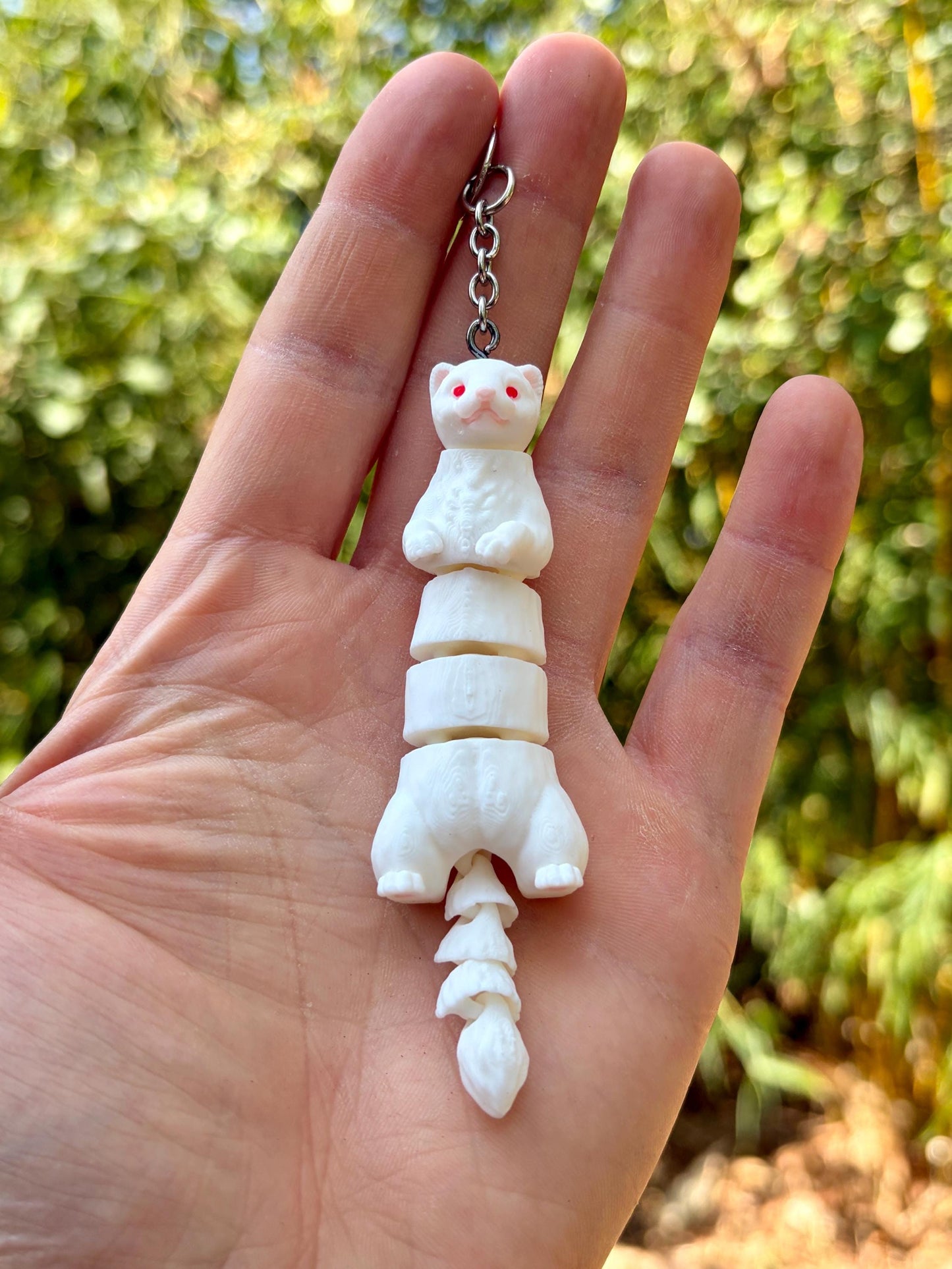 Articulated ferret keychains