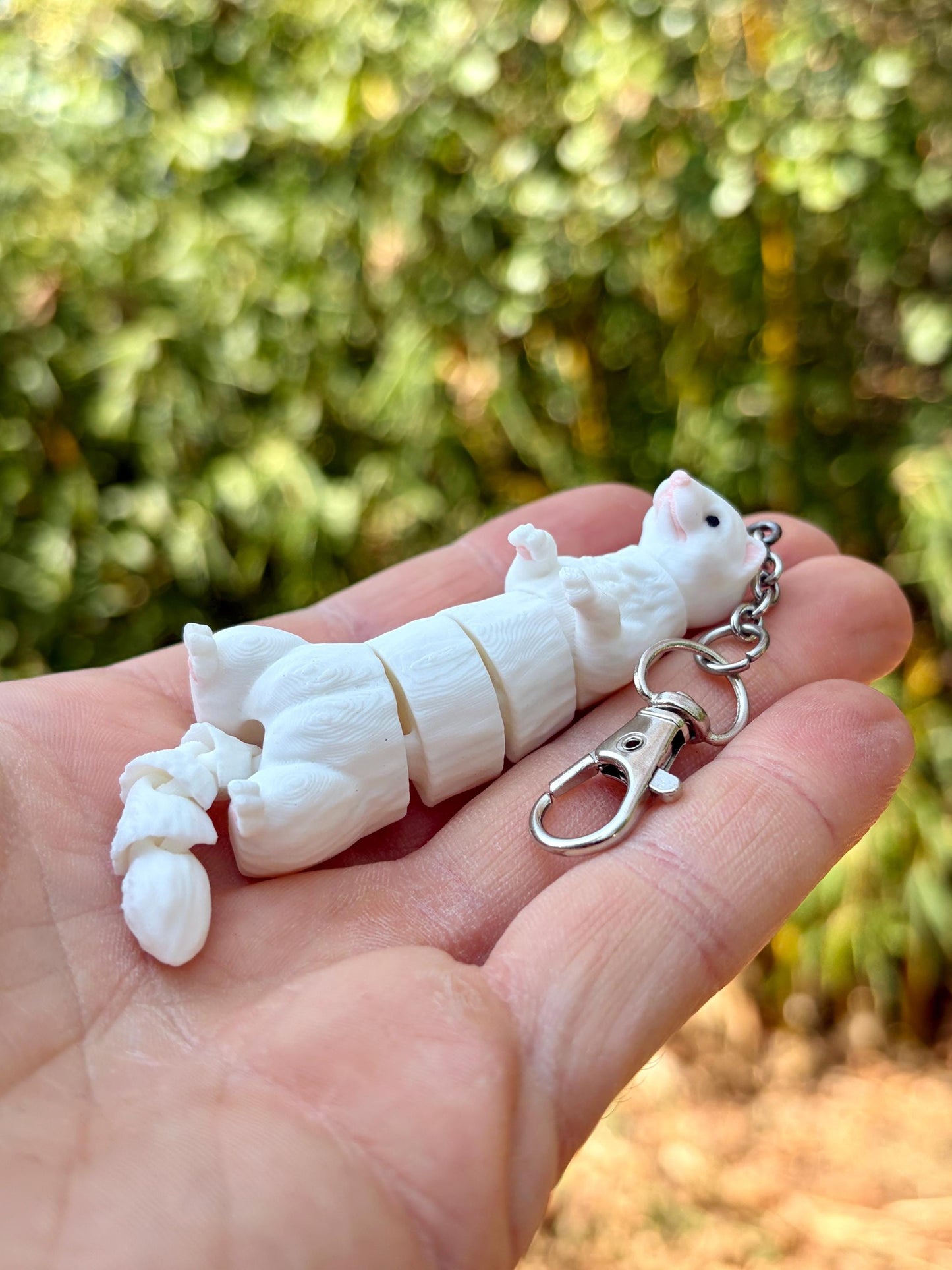 Articulated ferret keychains
