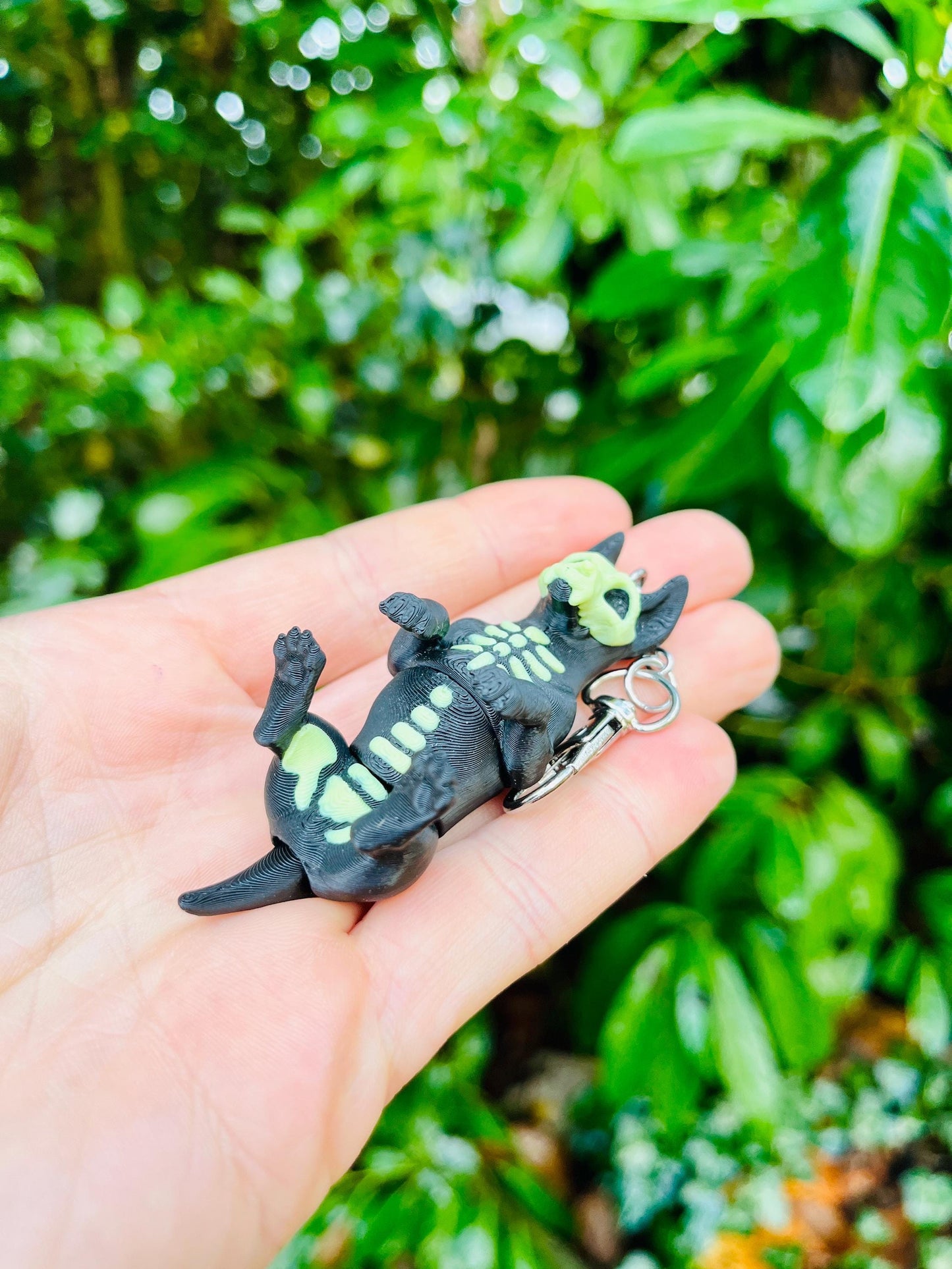 Glow-in-the-dark articulated skeleton dog keychain
