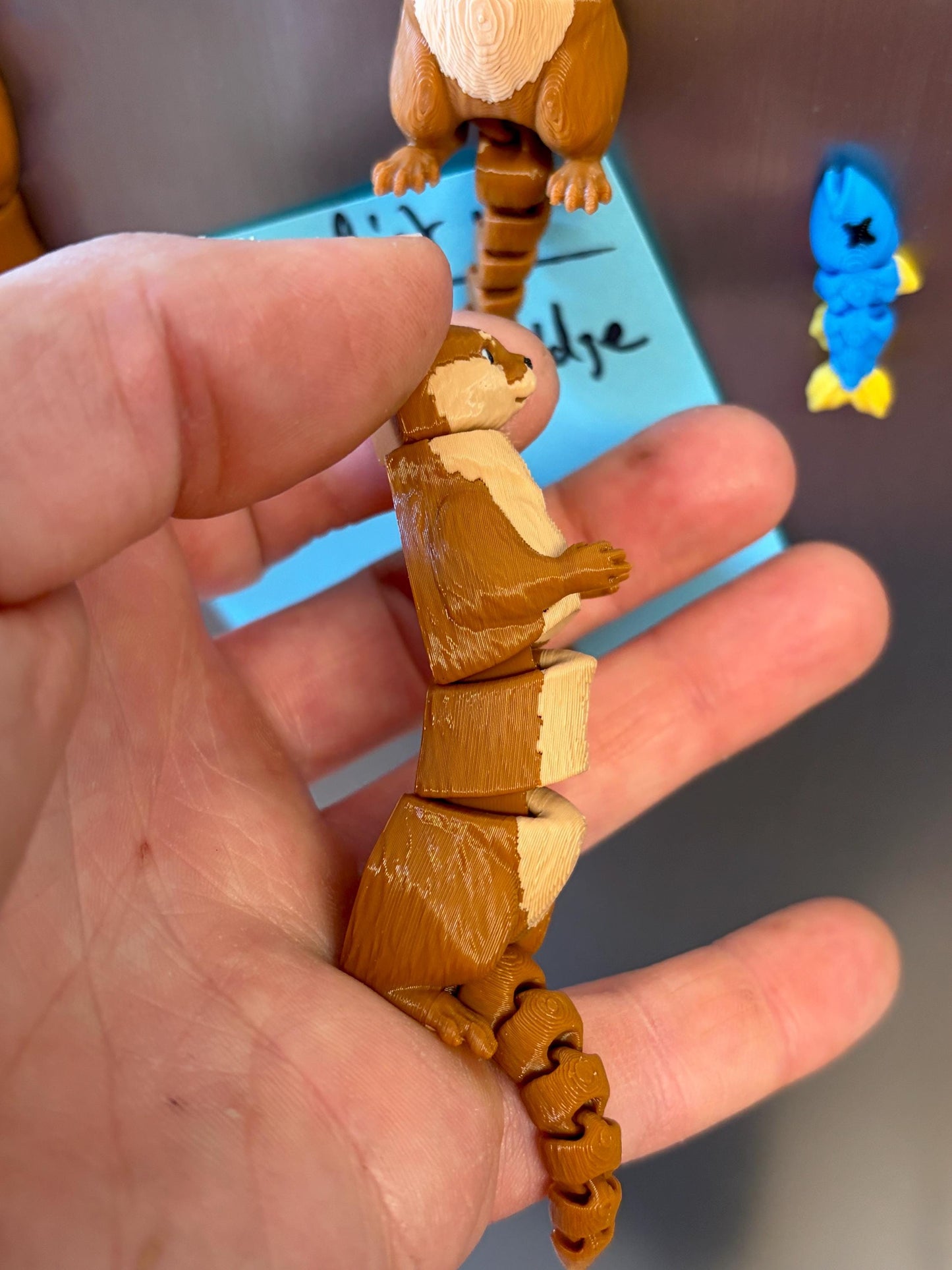 Articulated otter fridge magnet