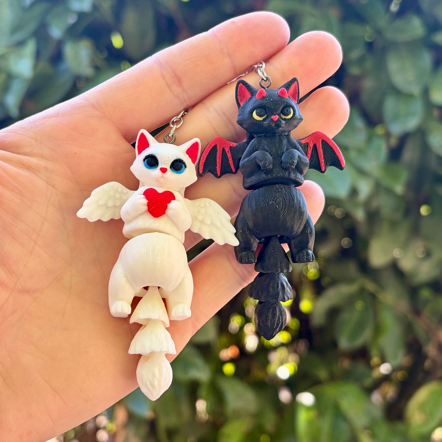 Porte-clés chats ailés articulés