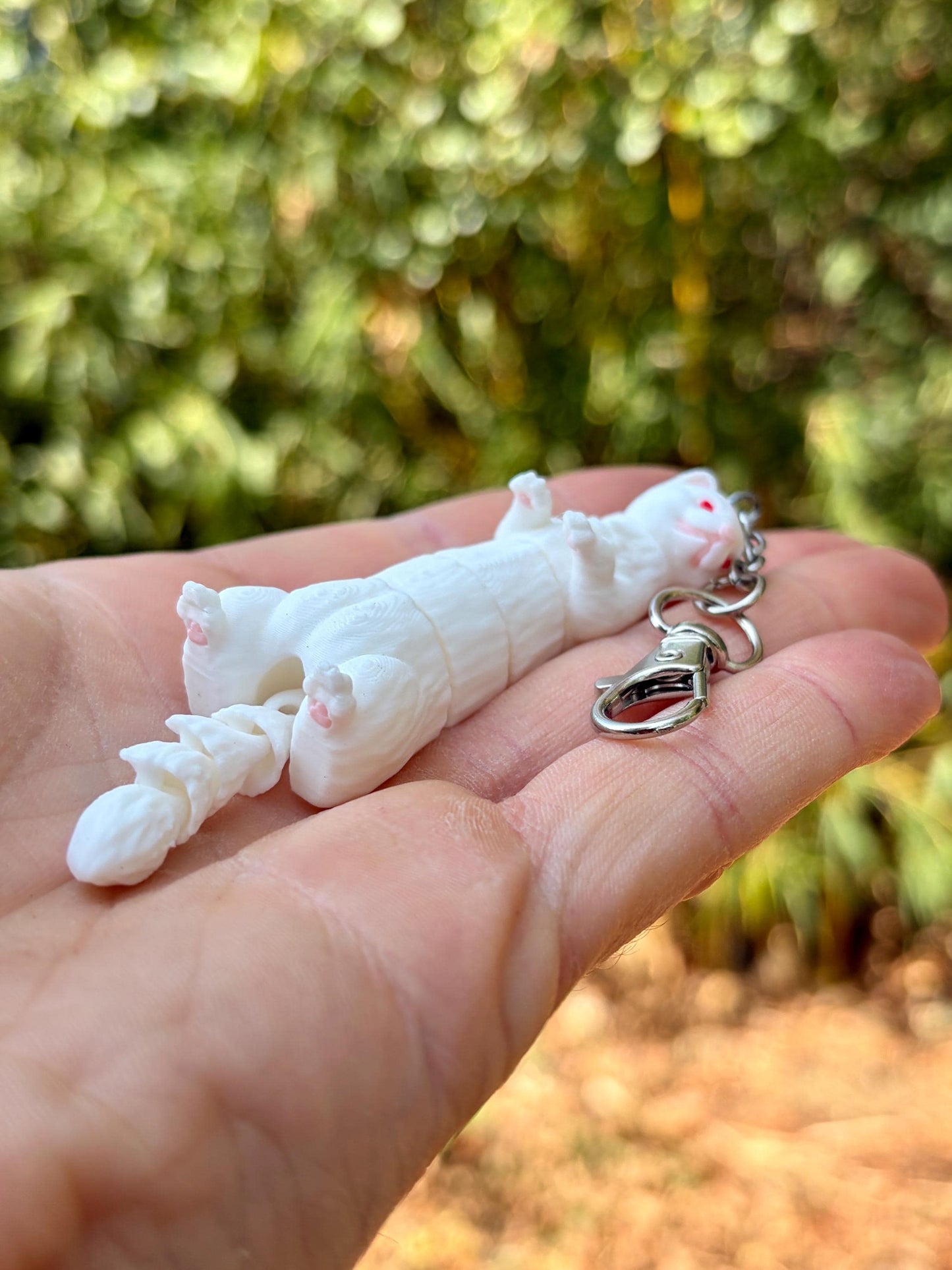Articulated ferret keychains