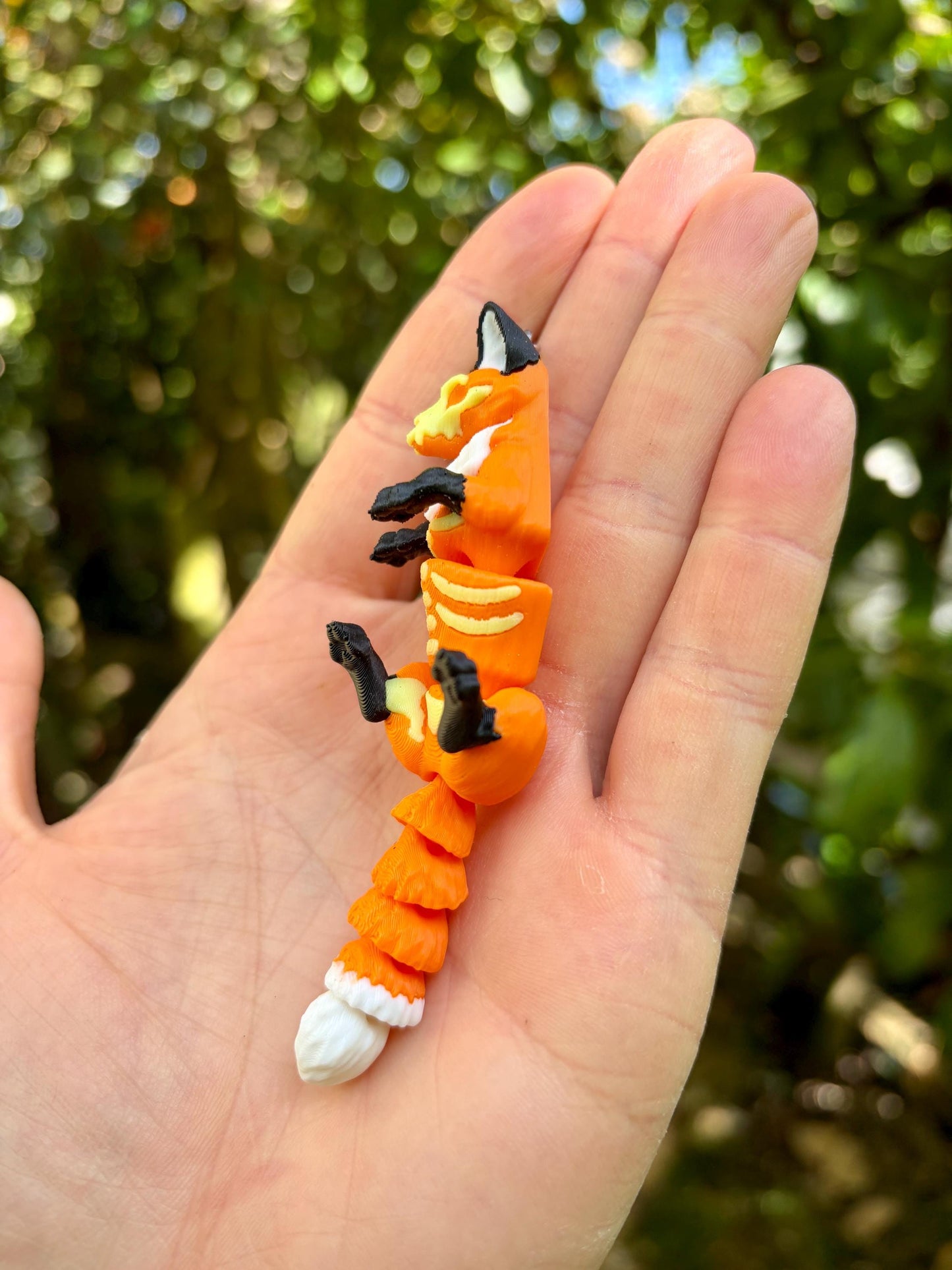 Articulated glow-in-the-dark skeleton fox keychain