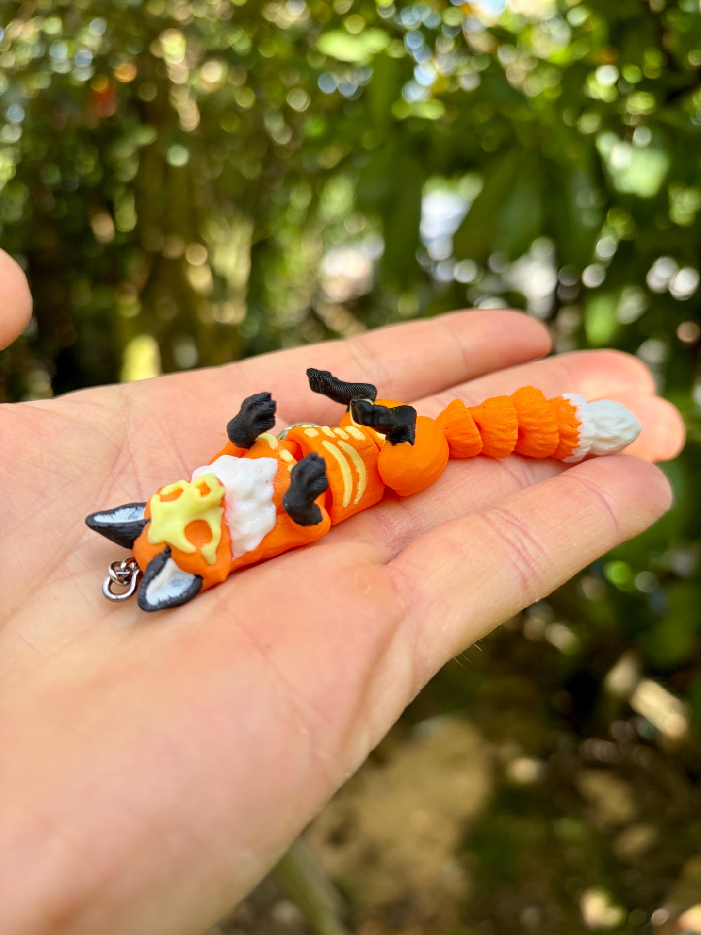 Articulated glow-in-the-dark skeleton fox keychain
