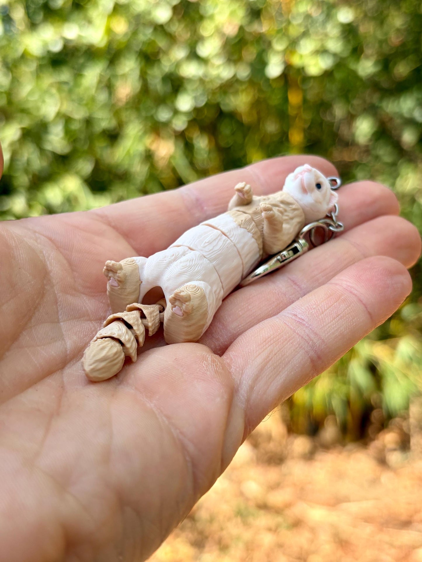 Articulated ferret keychains