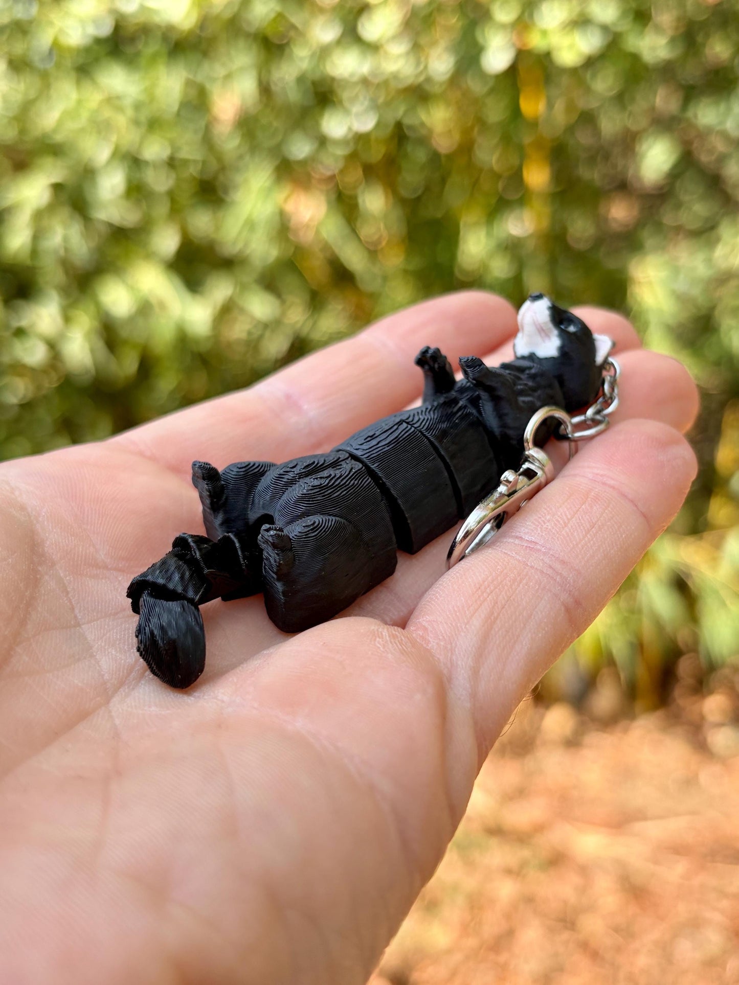 Articulated ferret keychains