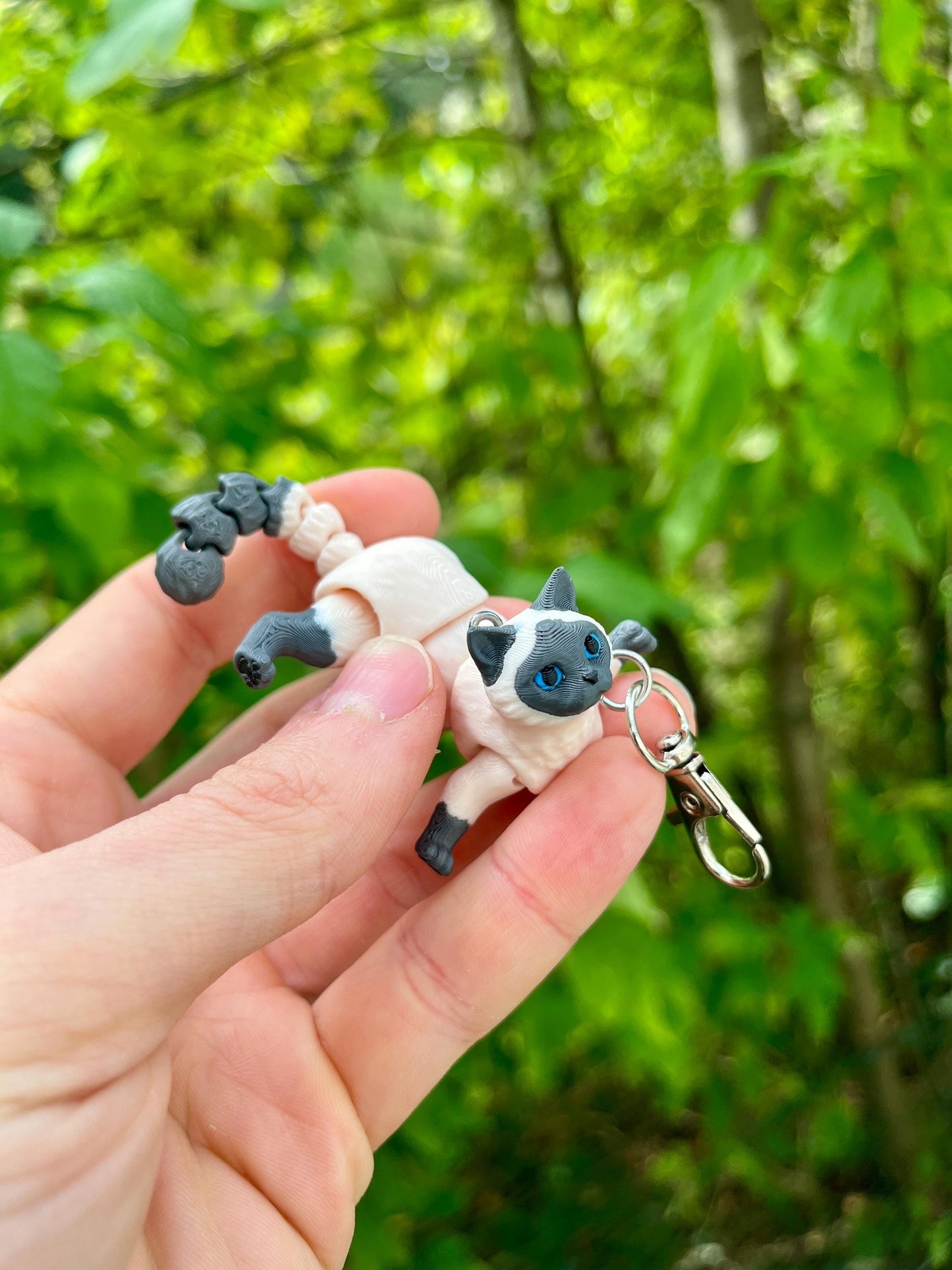 Articulated grey Siamese cat keychain